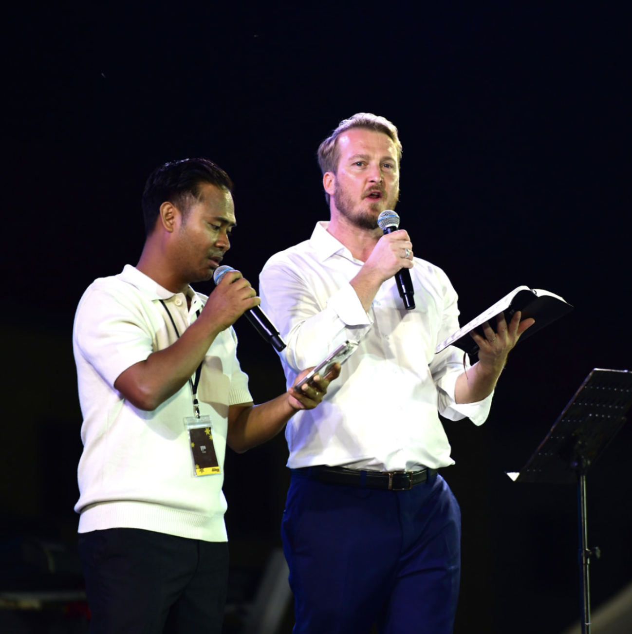 Preaching on stage with a local translator